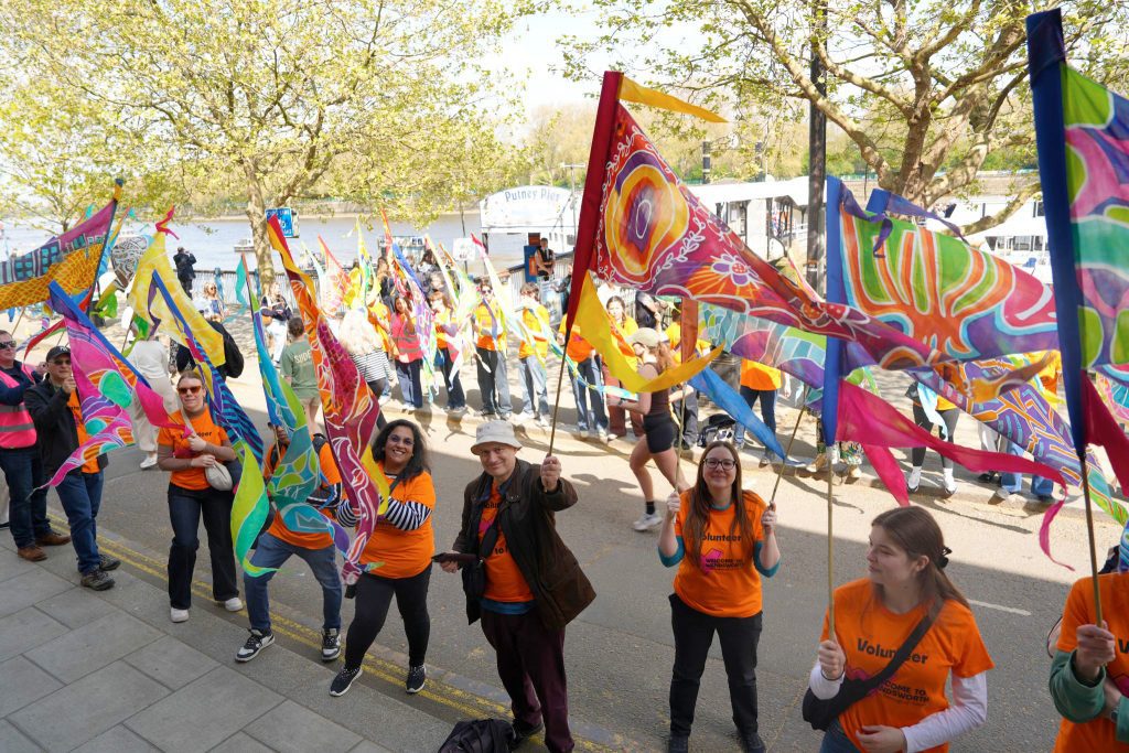 Colourful silk pennants at the London boat race