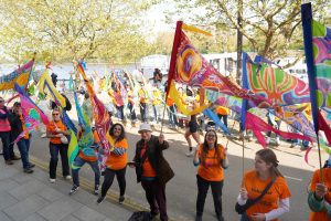 Colourful silk pennants at the London boat race