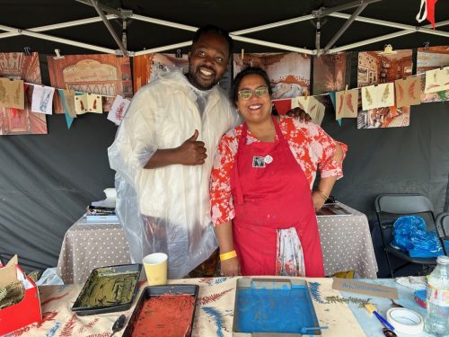 Roopa Basu with a visitor at the Happy Streets Festival printing stall